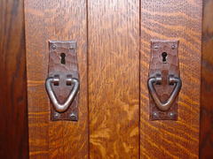 Close-up hand hammered copper pulls over keyed locks.  Locks made in Germany, everthing else made in U.S.A.
